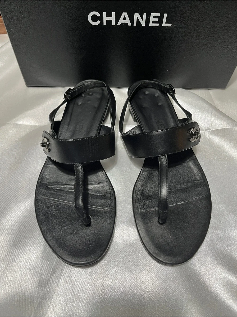 CHANEL Black Leather Thong Sandals with CC Medallion